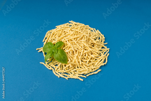 Raw Trofie Pasta, Dry Italian Macaroni, Traditional Genoa Food, Raw Noodle, Modern Ligurian Cuisine photo