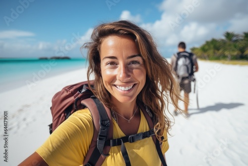 Happy traveler woman with b...