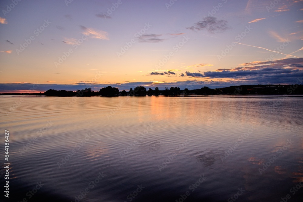 A stunning colorful sunset above the lake near Palava hills at South Moravia, Czech republic