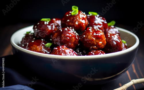 Culinary innovation with spicy meatballs with grape jelly. Meatballs glazed in a tempting spicy mix and delicious grape jam. Concept of inspiration of flavors and combinations.