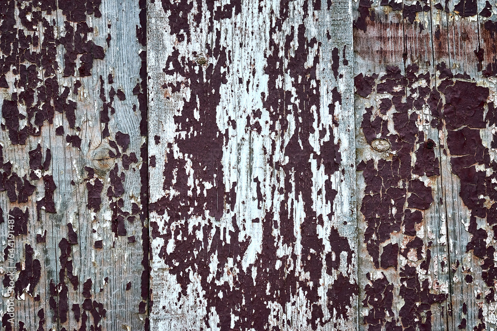 Fototapeta premium background, three old boards stand vertically with cracked dark paint