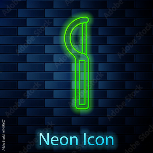 Glowing neon line Dental floss icon isolated on brick wall background. Vector