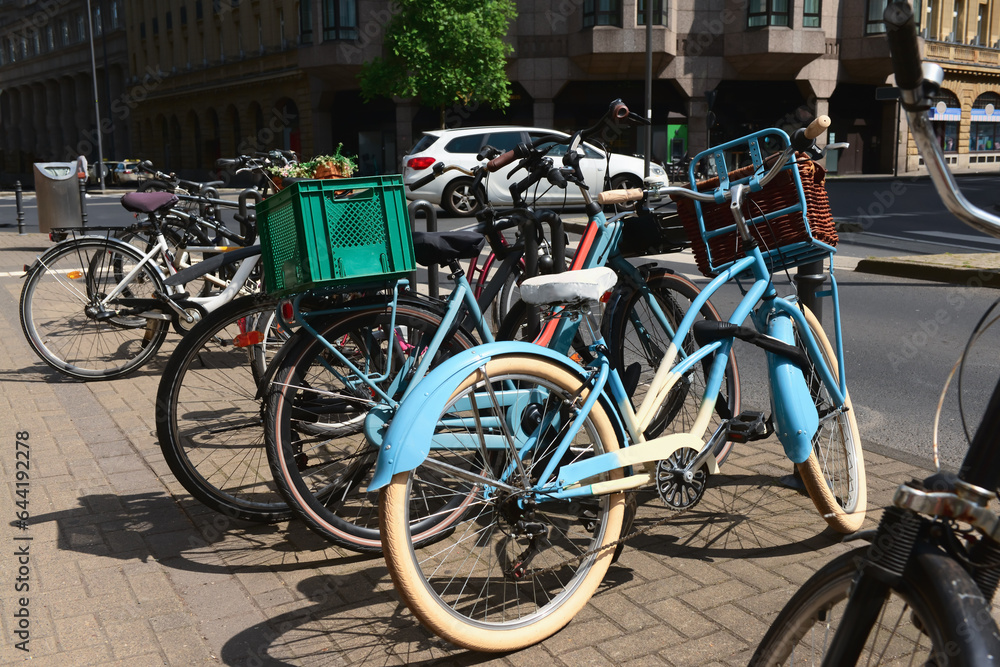 Modern bicycles parked on city street