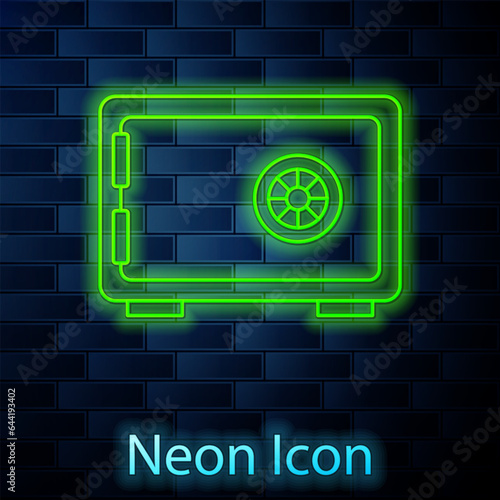 Glowing neon line Safe icon isolated on brick wall background. The door safe a bank vault with a combination lock. Reliable Data Protection. Vector