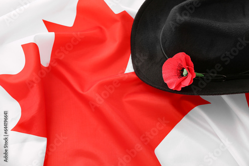 Canadian flag with black ha...