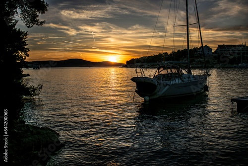 boat in sunset in lake