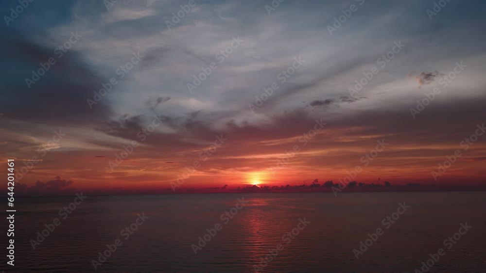 Dramatic ocean sunset. Burning sky and shining golden waves. Ocean beach sunsets. Dramatic ocean sunset. Burning sky and shining golden waves. Ocean beach sunsets.