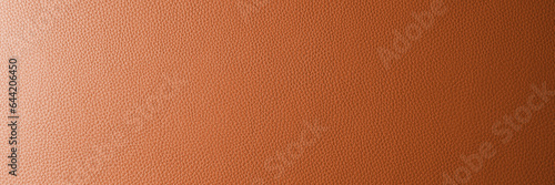 Abstract background, wide banner with orange gradient leather texture. Genuine structure, luxury pattern. Gradient, wallpaper, panoramic, wide, web banner, design element, backdrop.