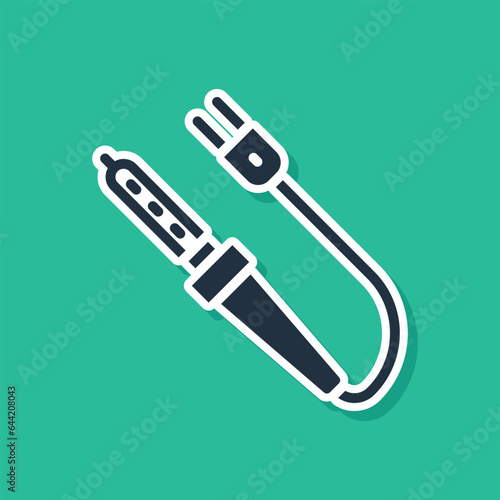 Blue Soldering iron icon isolated on green background. Vector