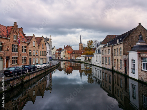 Idyllic canal reflections in medieval city of Bruges, Belgium