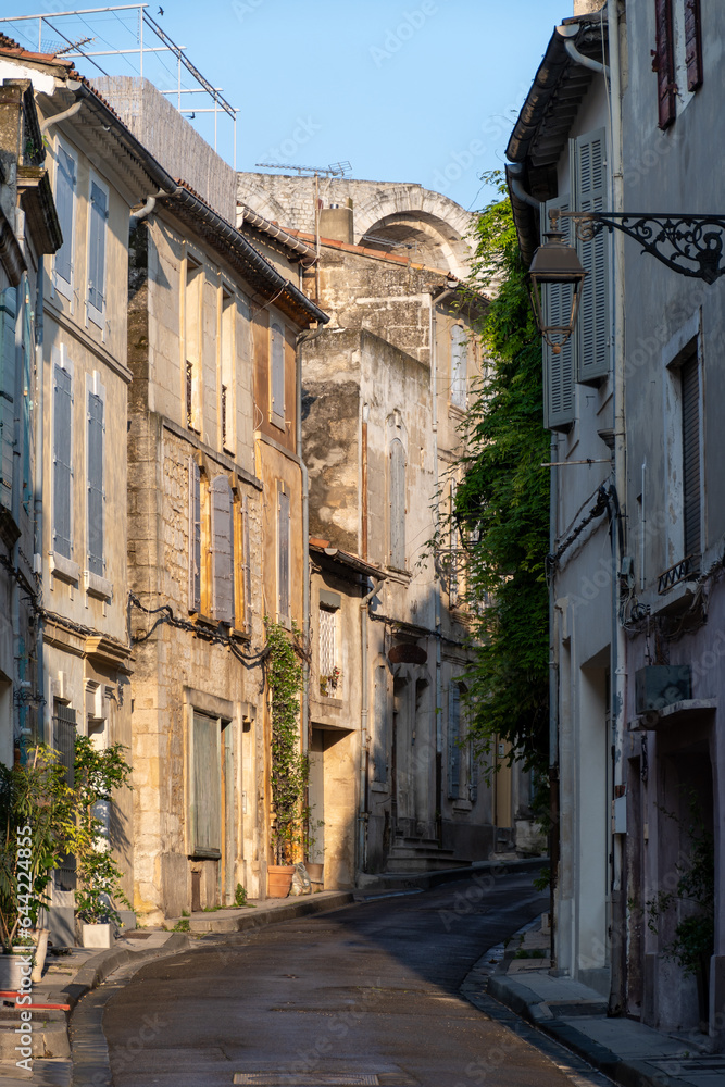 View on old streets and houses in ancient french town Arles, touristic destination with Roman ruines, Bouches-du-Rhone, France