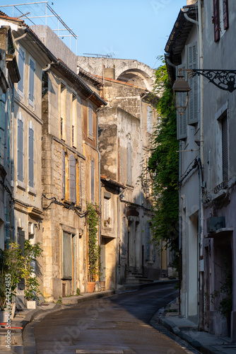 View on old streets and houses in ancient french town Arles, touristic destination with Roman ruines, Bouches-du-Rhone, France