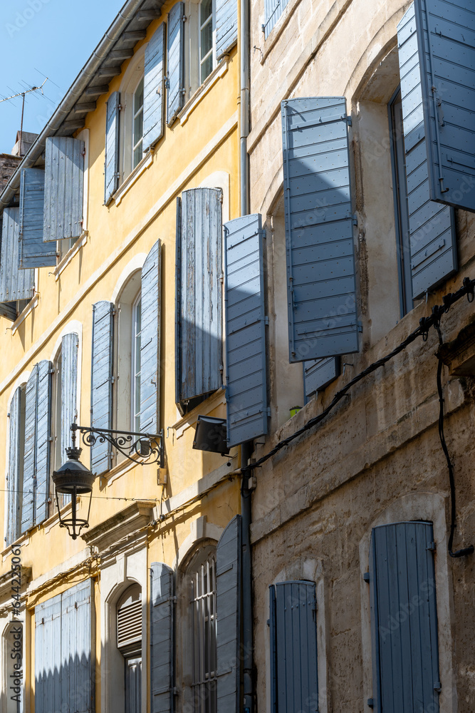 Obraz premium View on old streets and houses in ancient french town Arles, touristic destination with Roman ruines, Bouches-du-Rhone, France