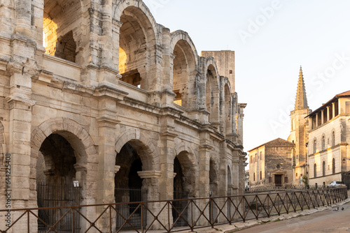 View on old streets and Roman Arena in ancient french town Arles, touristic destination with Roman ruines, Bouches-du-Rhone, France