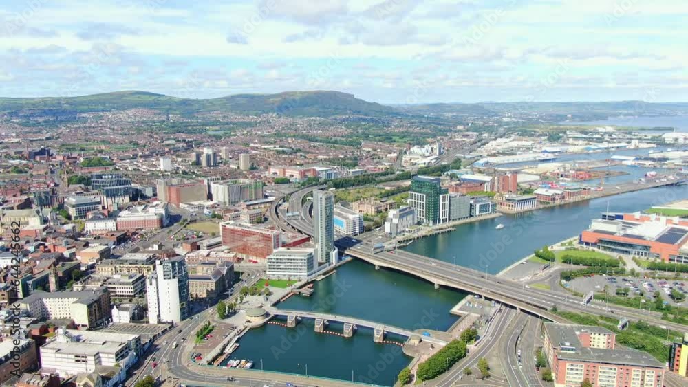 Aerial view on buildings and Lagan River in City center of Belfast Northern Ireland. Drone photo, high angle view of town Aerial view on buildings and Lagan River in City center of Belfast Northern Ireland. Drone photo, high angle view of town