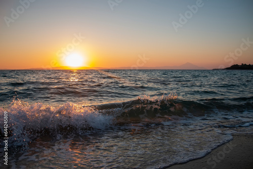 Beautiful nature with sunrise on the beach and sea or ocean.  Nature composition.