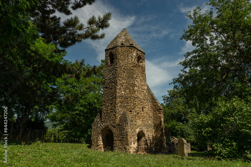 Ancient basalt tower of Avas church ruin at Szigliget near Lake Balaton, Hungary