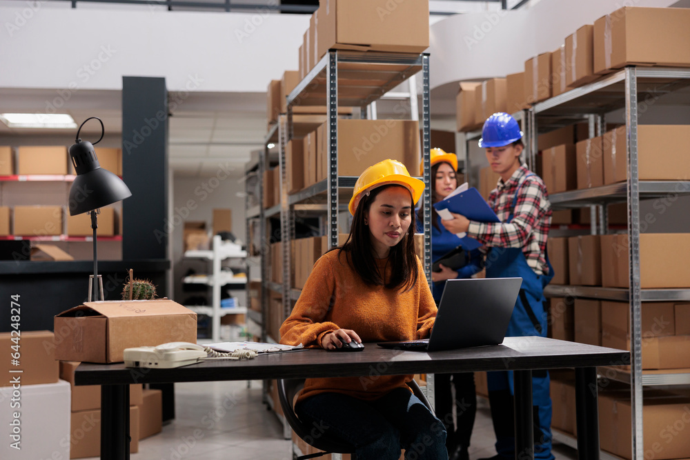 shipment-service-worker-checking-warehouse-products-management-system