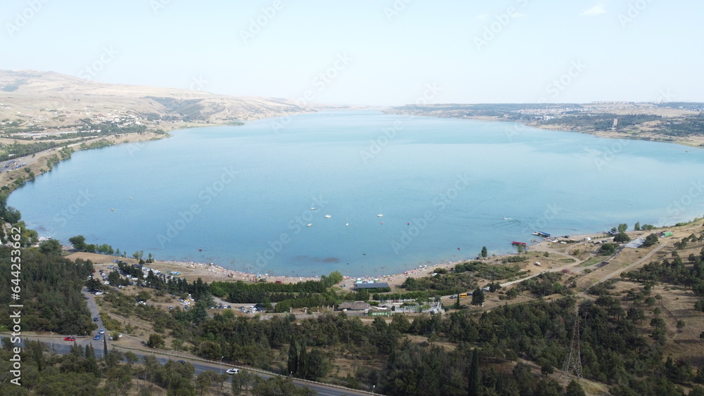 A drone shot of the Tbilisi Reservoir from its western bank with the vantage point of the Chronicle of Georgia Complex