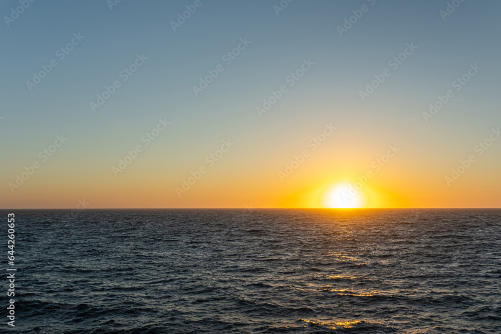 San Francisco, CA, USA - July 13, 2023: 1 of 4, Pacific Ocean sunset west of San Francisco. Blackish water. 