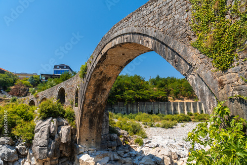 The beautiful Old Mes bridge near Shkoder. Albania, Europe. Ottoman stone arch bridge Ura e Kadiut