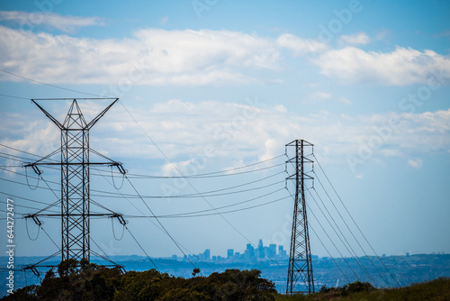 Los Angeles skyline through power lines and towers