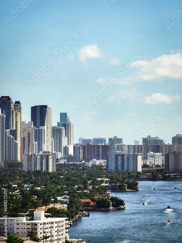 sunny isles skyline overlooking a busy intercoastal waterway 