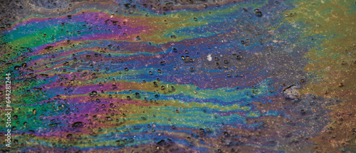 Abstract background of oil spilled on the water. Colorful background.