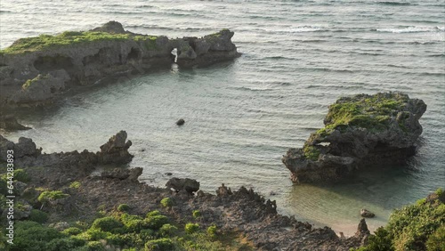 Aerial view of cliff and coastal reefs in Okinawa Japan.