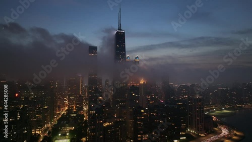 Chicago Ariel drone footage of the skyline at night time
