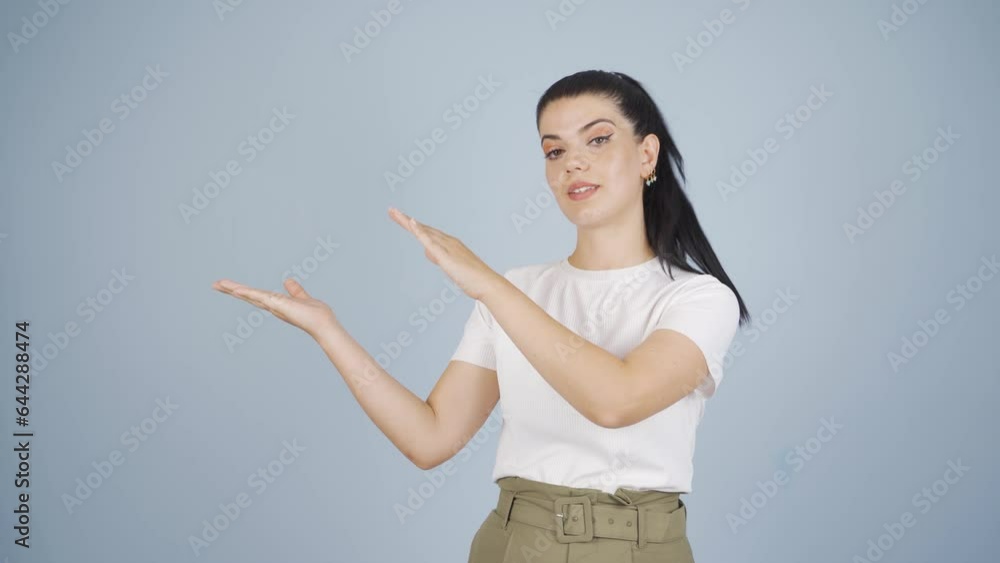 Woman showing something with open hands. Woman showing something with open hands.