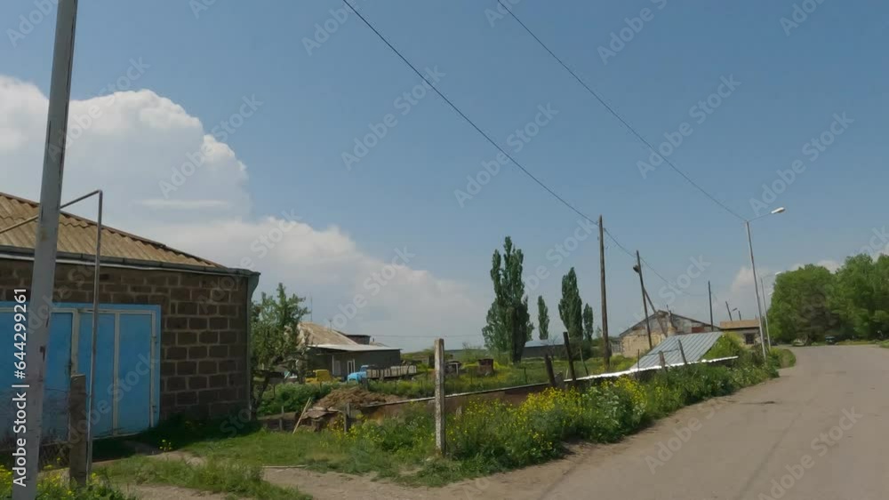 Driving On The Street In Georgian Village Through Rural Houses. POV Driving On The Street In Georgian Village Through Rural Houses. POV