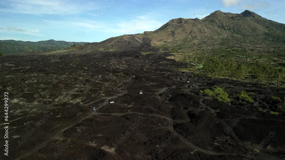 Aerial view of Black Lava eruption site of Mount Batur in Bali, Indonesia Aerial view of Black Lava eruption site of Mount Batur in Bali, Indonesia