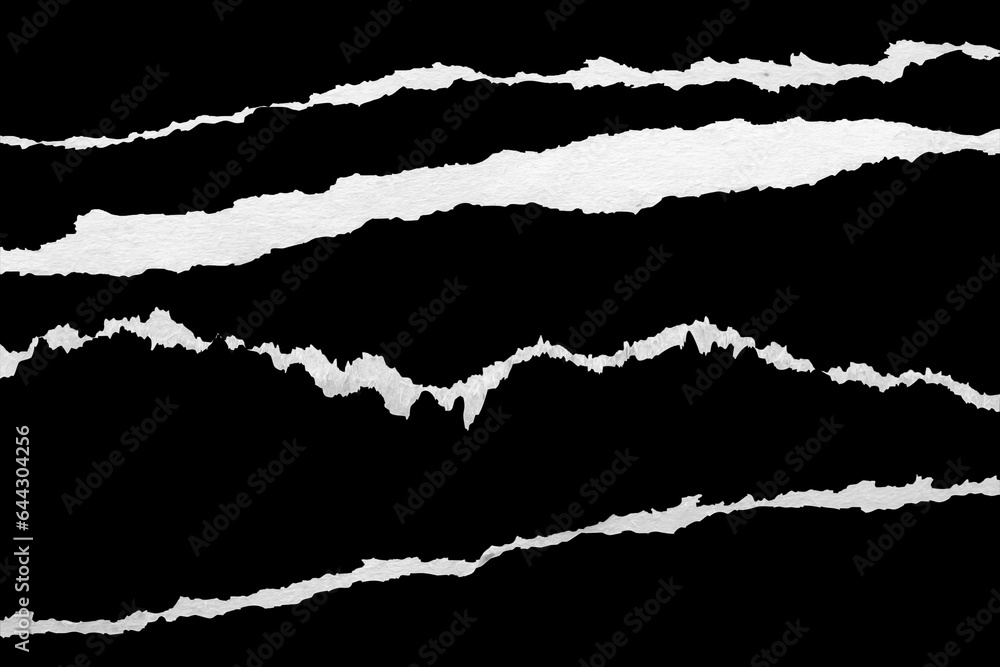 Ripped torn paper edges set isolated on black background Ripped torn paper edges set isolated on black background