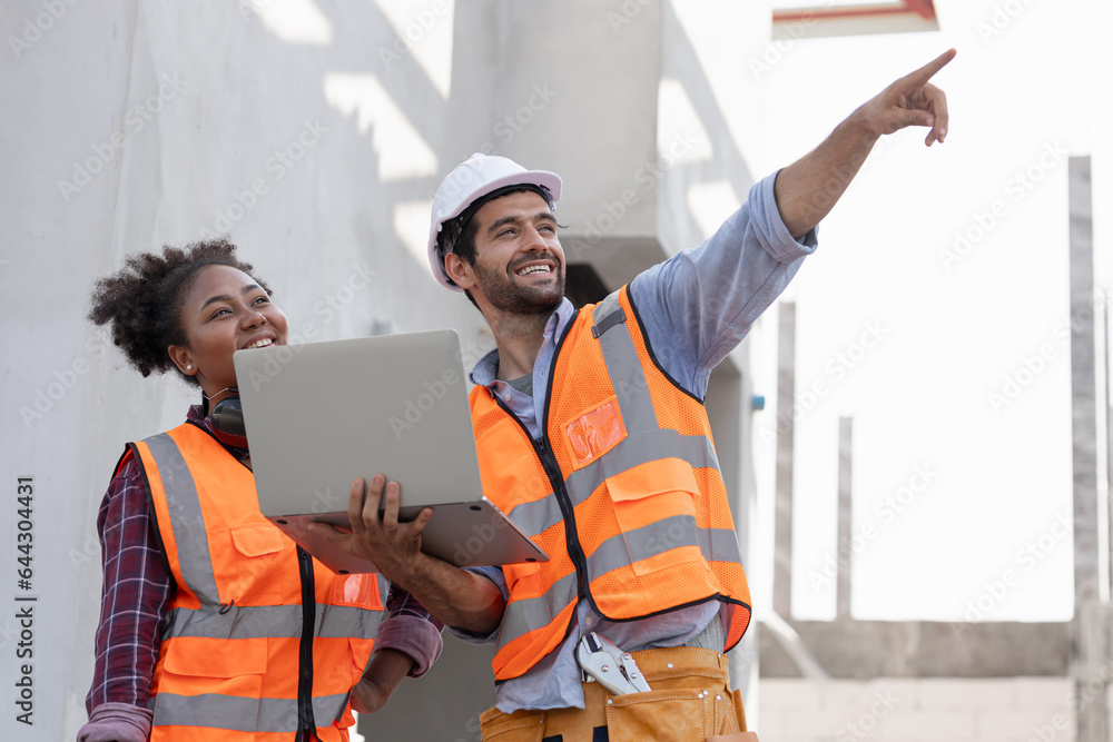 Staff engineers in uniforms and safety helmet are inspecting work and the job training he works in factory industrial machinery. Staff engineers in uniforms and safety helmet are inspecting work and the job training he works in factory industrial machinery.