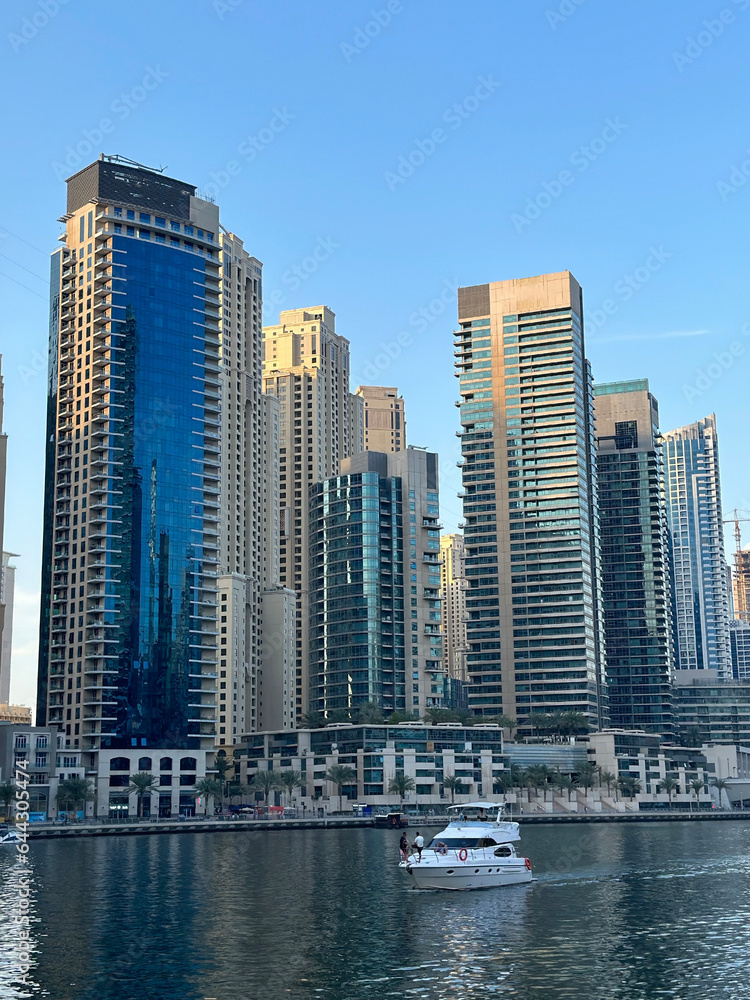 Dubai Marina in Dubai, UAE. View of the skyscrapers and the canal. Dubai Marina in Dubai, UAE. View of the skyscrapers and the canal.
