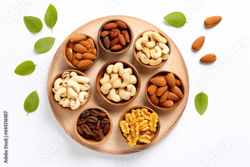 Wooden plate filled with variety of nuts. Perfect for food-related projects and healthy eating concepts.