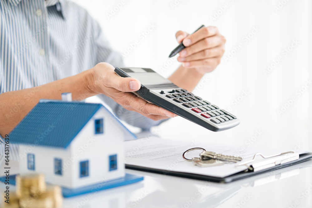 Fototapeta premium Real estate agents bid homes in the project to explain in detail to clients. Explain and present information about home and mortgage purchases. real estate trading ideas