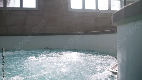 Slow motion pull-out shot of a thalassotherapy spa at the state of the art spa photo