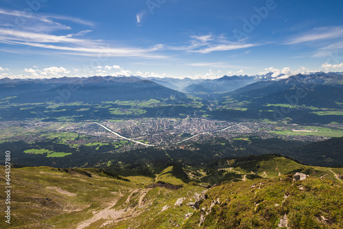 Panoramic view over Innsbruck in Tyrol in Austria in summer from the mountain  photo