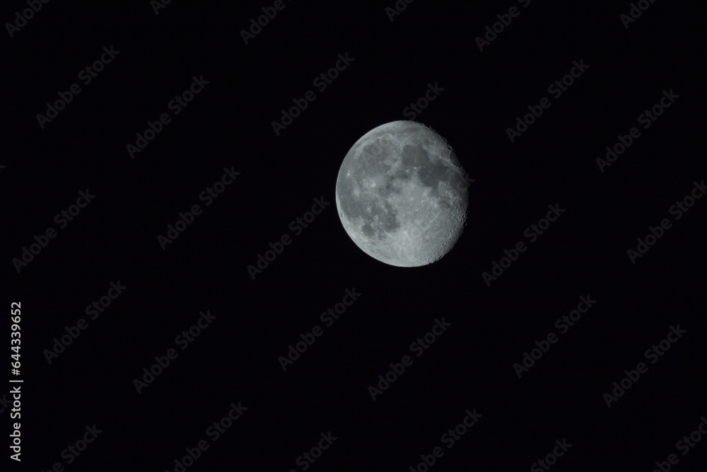 closeup huge moon on night dark sky background closeup huge moon on night dark sky background