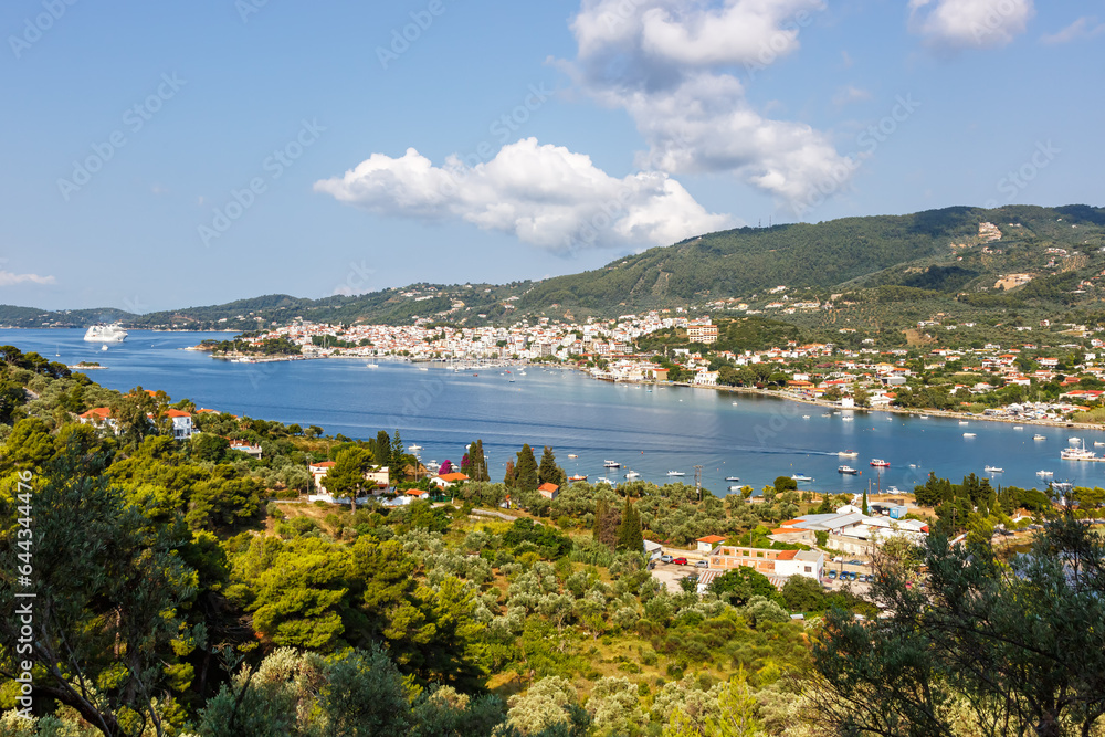 Overview of sea bay and Skiathos town vacation at the Mediterranean Sea Aegean island in Greece