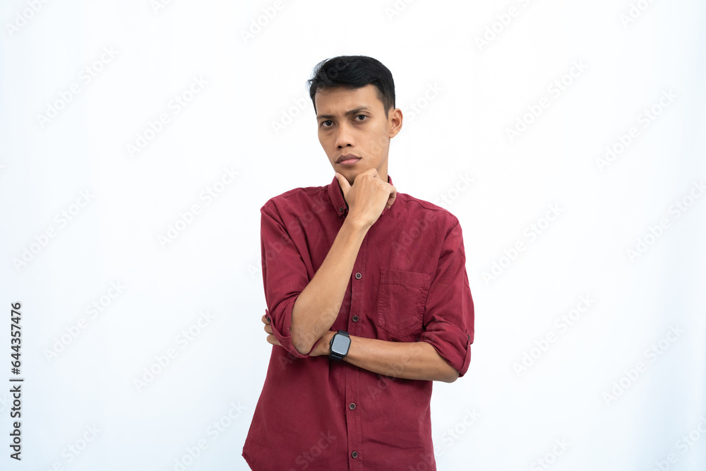 asian man, business or student concept wearing red casual shirt thinking pose, looking for ideas, getting ideas, confused. Isolated white background. asian man, business or student concept wearing red casual shirt thinking pose, looking for ideas, getting ideas, confused. Isolated white background.