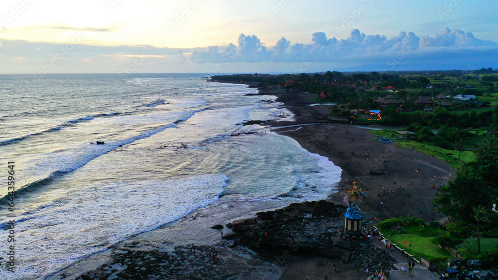 Fototapeta premium black sand beach view seen from pererenan beach, canggu bali.