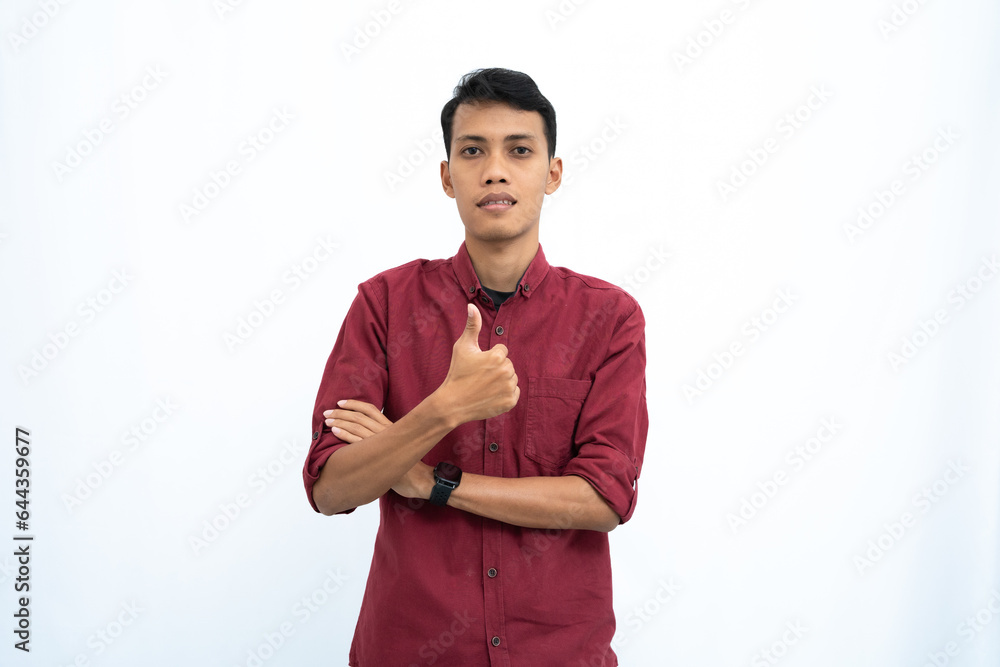 asian man, businessman or student concept wearing red casual shirt showing thumbs up that agree, okay. Isolated white background. asian man, businessman or student concept wearing red casual shirt showing thumbs up that agree, okay. Isolated white background.