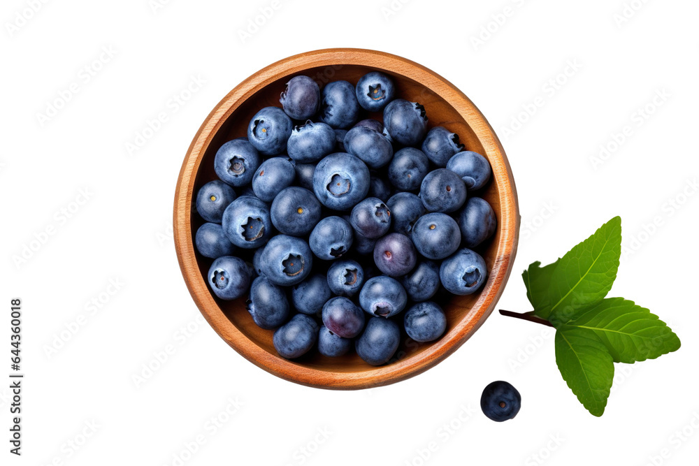 Fresh blueberry in a wooden bowl. Juicy and fresh blueberries with green leaves on a white background