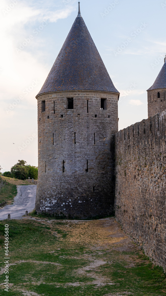 Old romanic tower with a wall in Carcassonne