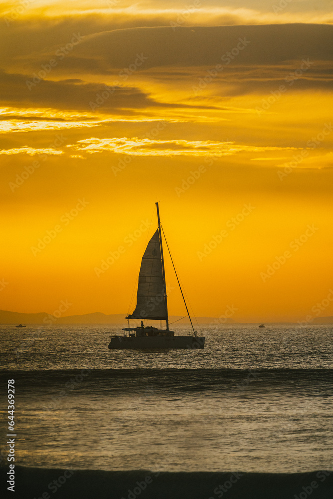 sailboat at sunset silhouette