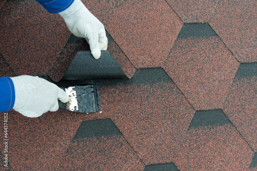 roof repair elimination of leakage smear seams and cracks with a trowel tar