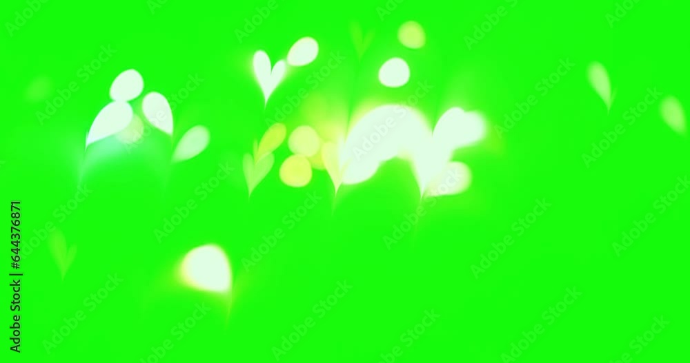 Animation of shiny glowing glowing hearts scattered on green screen background. Valentine's Day. Animation of shiny glowing glowing hearts scattered on green screen background. Valentine's Day.
